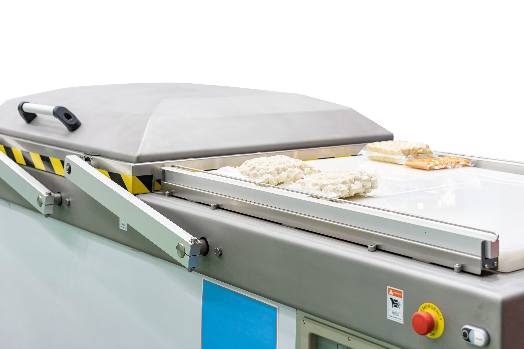 Machine sous vide (double cloche) avec sacs sous vide sur le convoyeur — AB Flexibles